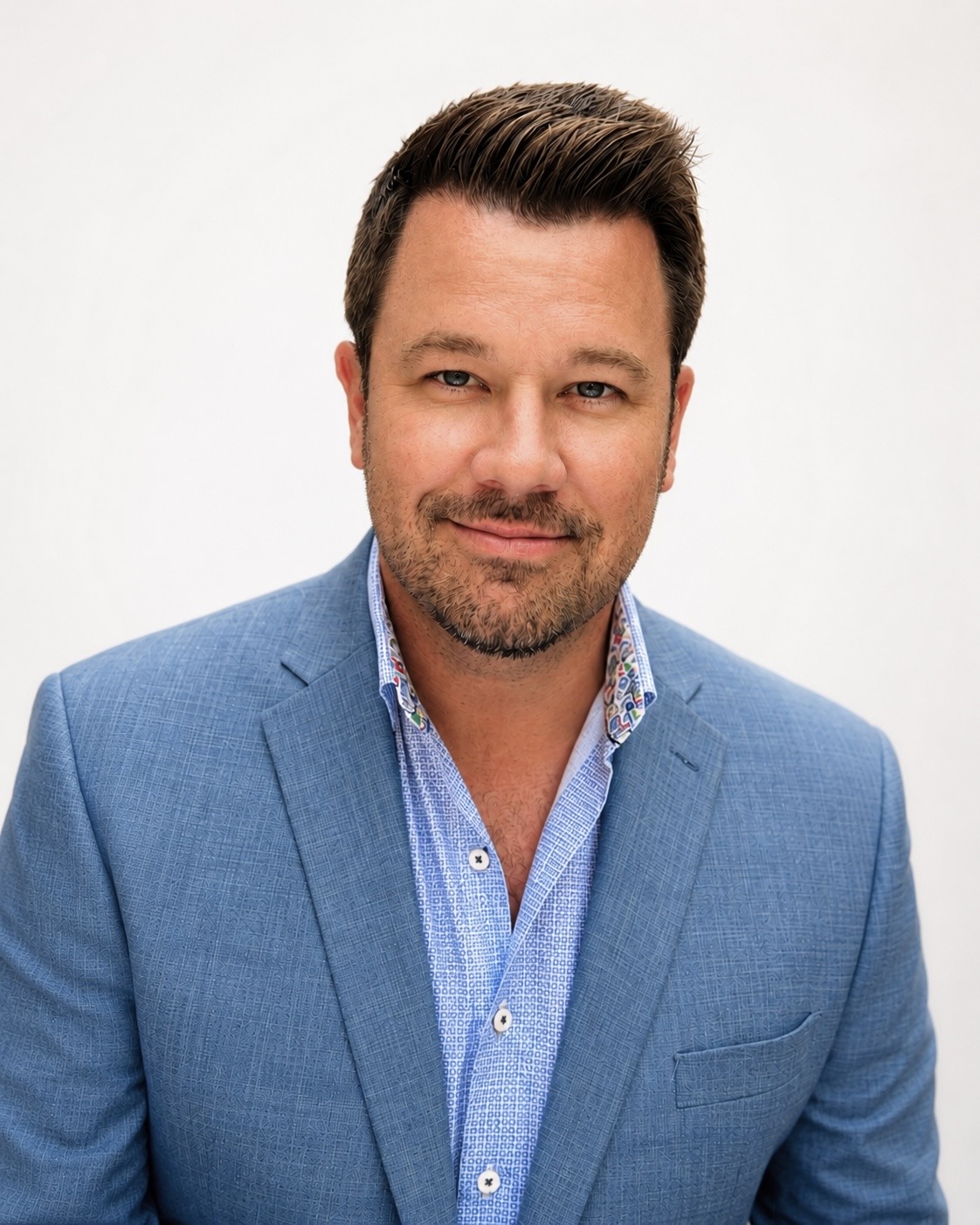 Tim Calahan wearing a blue blazer